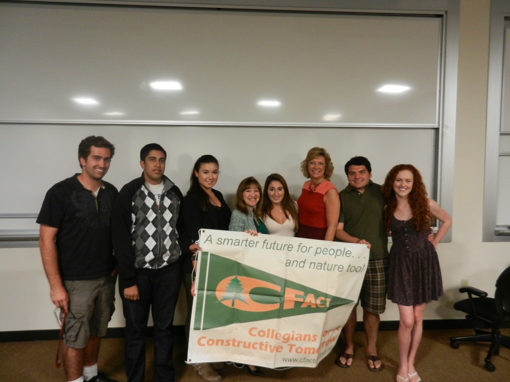 Marita Noon and several Collegians pose for a photo after the event at Pepperdine