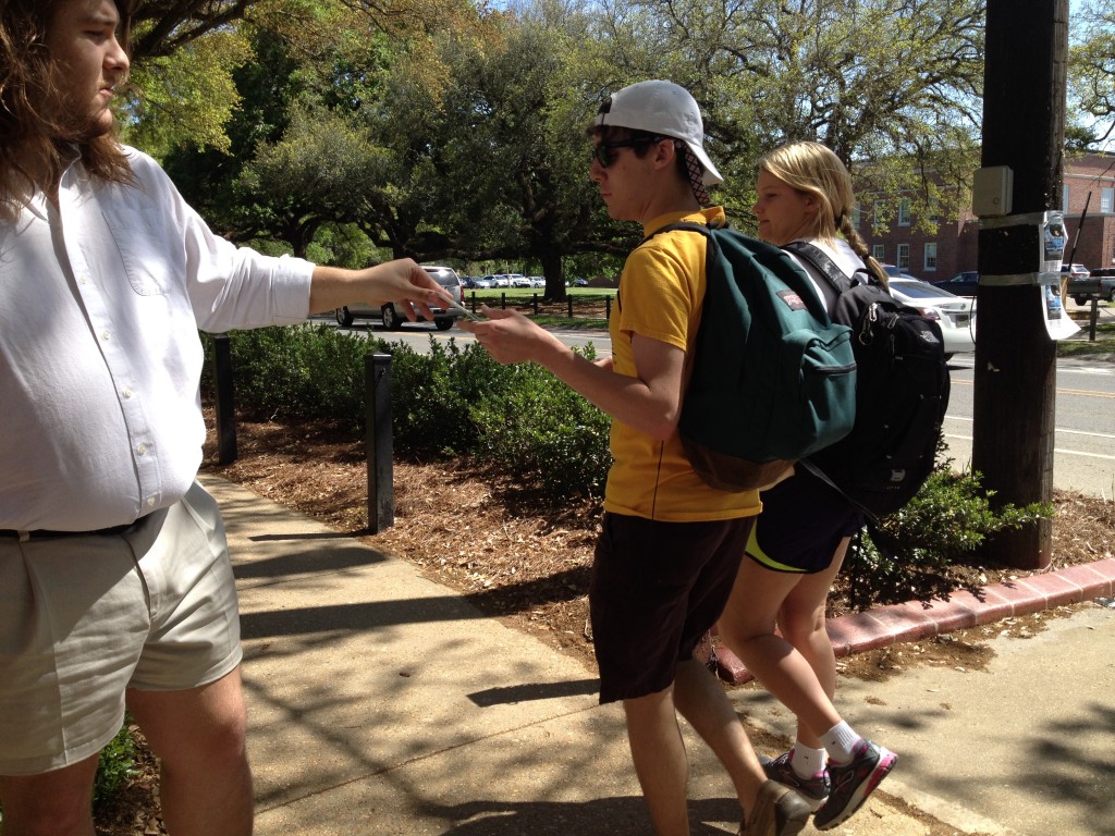 Graham Beduze distributes REAL Energy literature on ULL's campus